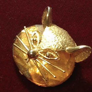 Cat brooch with amber glass cabochon
